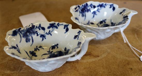 A pair of Worcester Butter Boat Mansfield pattern butter boats, c.1760, length 8.7cm and 9.2cm, shallow chip to one rim